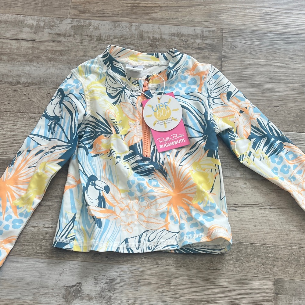 NWT - Ruffle Butts Tropical Print Rashguard - Blue, Yellow, Orange